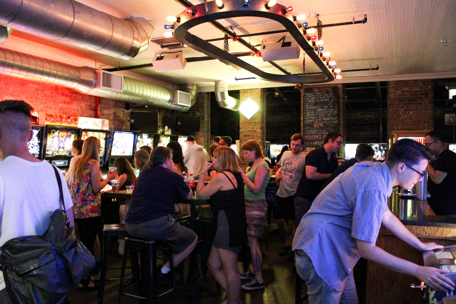 Wash, Dry And Drink At This Hidden Laundromat Pinball Bar